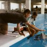 Still of Austin Highsmith and Austin Stowell in Dolphin Tale