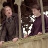 Still of David Thewlis and Daniel Radcliffe in Harry Potter and the Prisoner of Azkaban