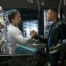 Still of Robert Downey Jr. and Terrence Howard in Iron Man
