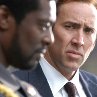 Still of Nicolas Cage and Eamonn Walker in Lord of War