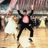 Still of John Travolta and Olivia Newton-John in Grease