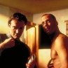 Still of Quentin Tarantino and Bruce Willis in Pulp Fiction