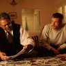 Still of Brad Pitt and Morgan Freeman in Se7en