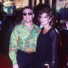 Jean-Claude Van Damme and Darcy LaPier at event of Waterworld