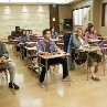 Still of Tom Hanks, Rami Malek and Natalie Grace in Larry Crowne