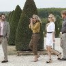 Still of Owen Wilson, Michael Sheen and Rachel McAdams in Midnight in Paris