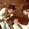 Still of Malcolm McDowell, Warren Clarke and James Marcus in A Clockwork Orange