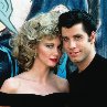 Still of John Travolta and Olivia Newton-John in Grease